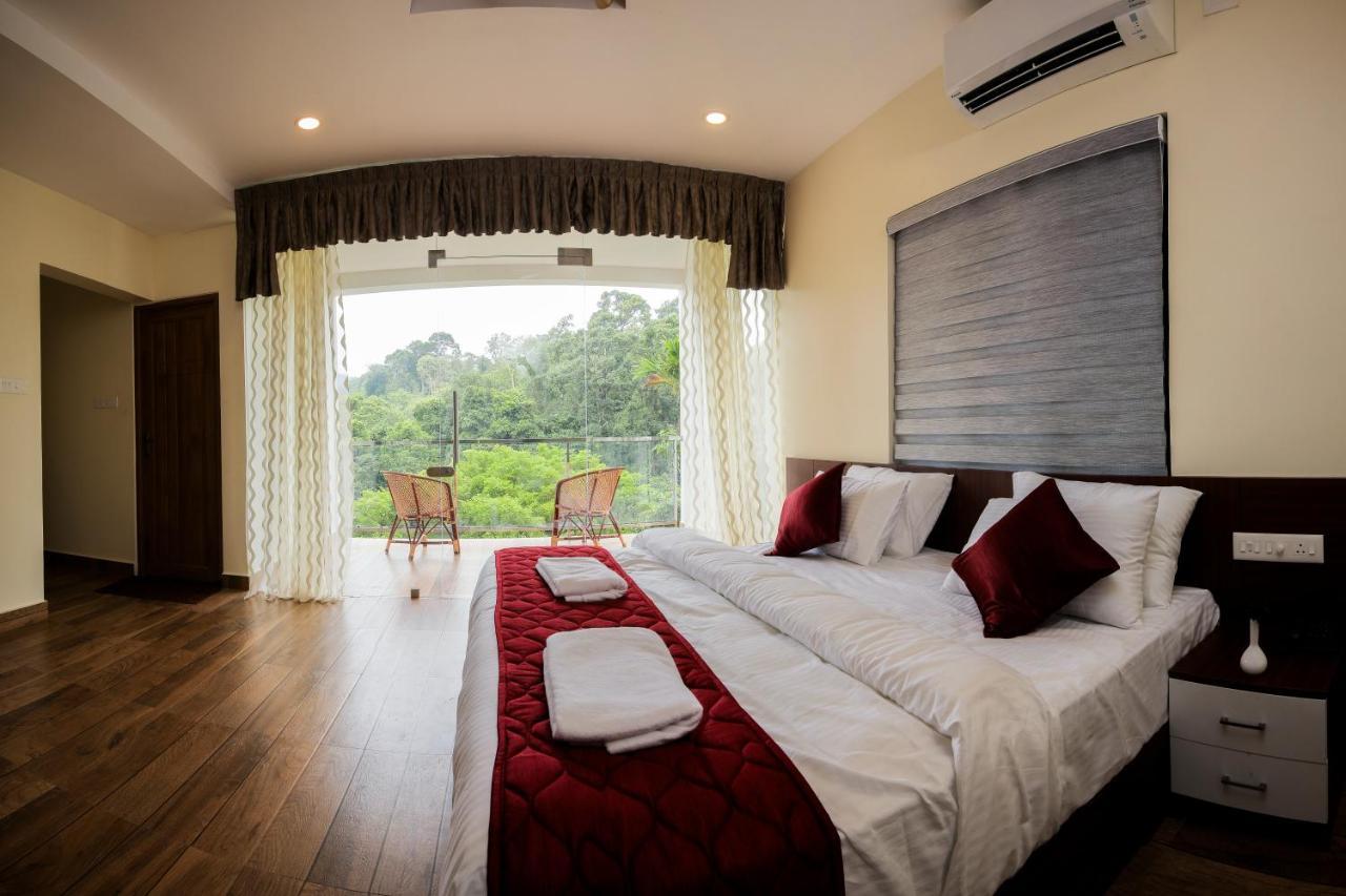 Thenmala Hormuz Inn Kolattupuzha エクステリア 写真