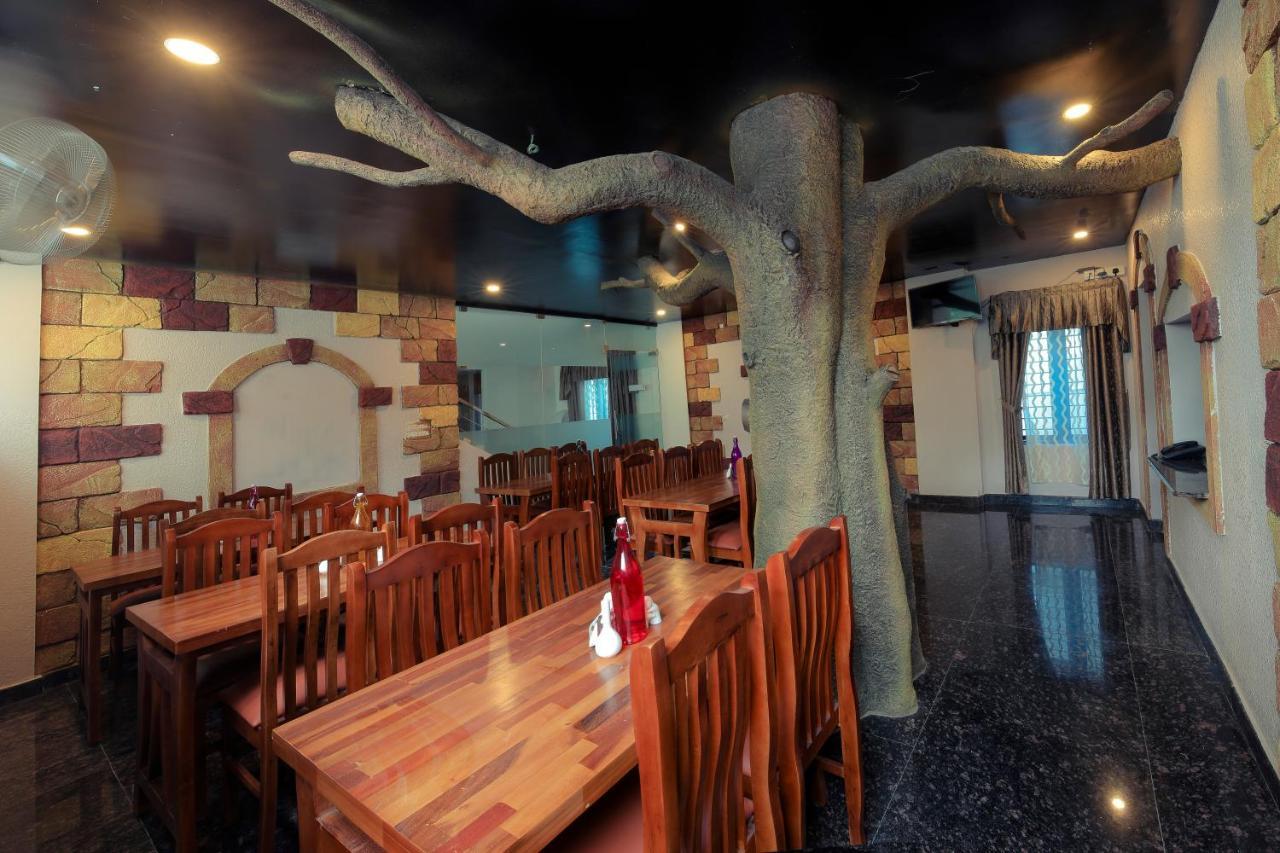 Thenmala Hormuz Inn Kolattupuzha エクステリア 写真